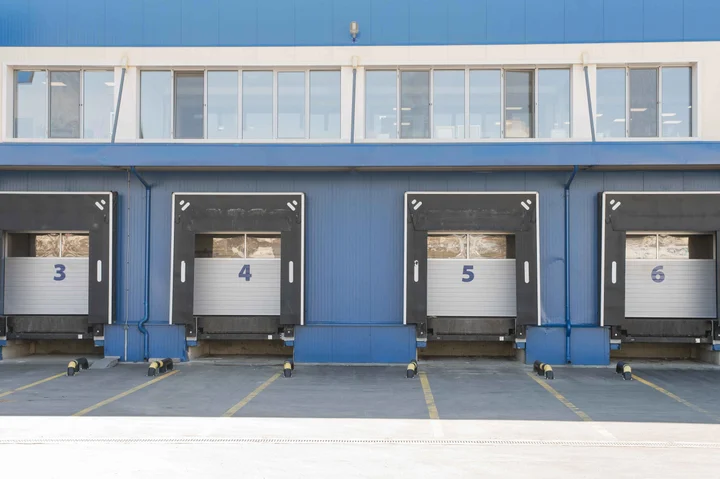 Numbered loading dock doors along a distribution center