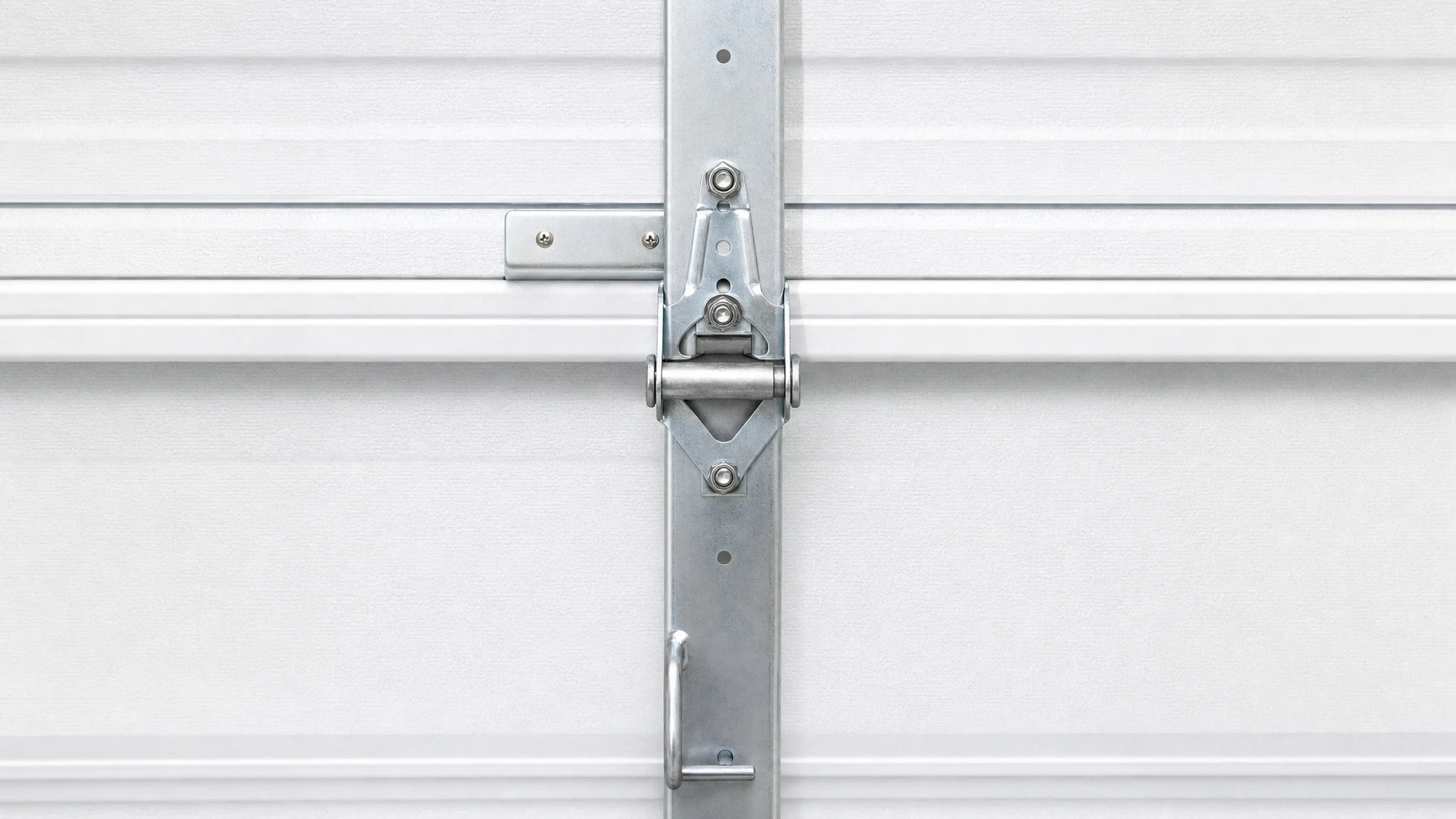 New galvanized garage door hinge and roller after replacement