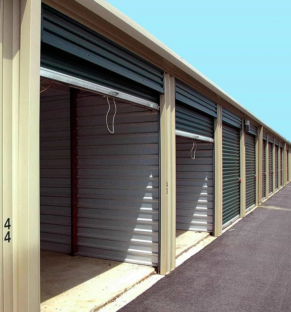 Row of roll-up doors at a self-storage facility
