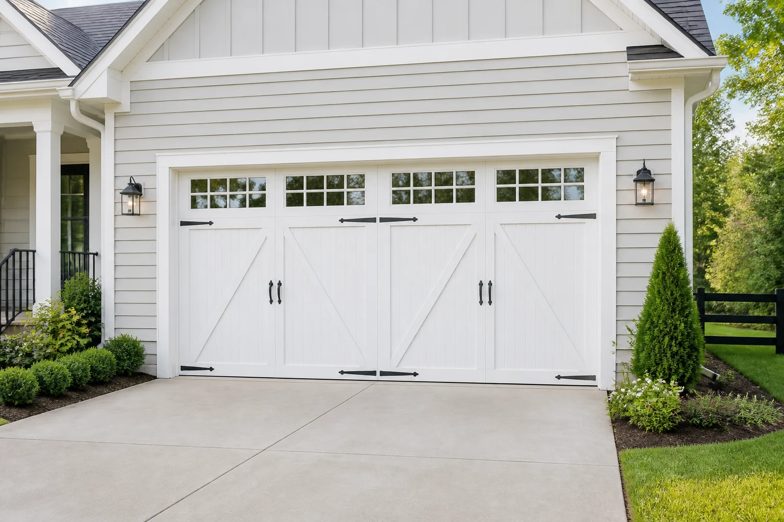 White carriage house garage door installed on a Kentucky home